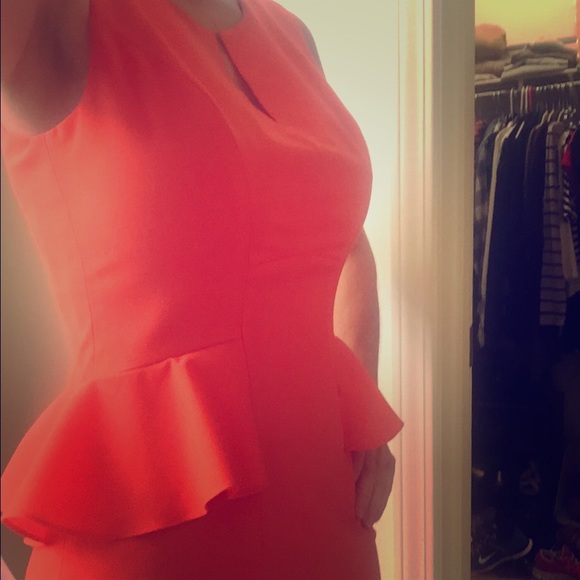 Coral peplum Karlie sleeveless dress.