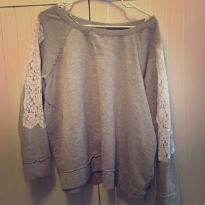 Sweater with lace shoulders