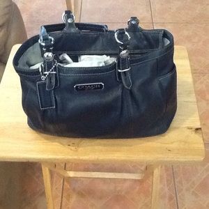 Coach black leather purse.