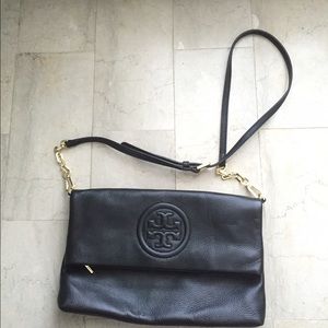 Tory Burch black fold over cross body/clutch bag
