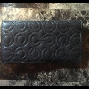 Black coach checkbook cover