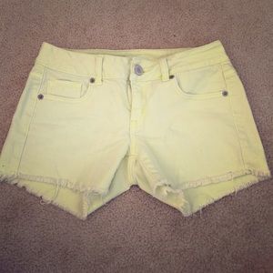 American Eagle midi neon yellow denim cut offs