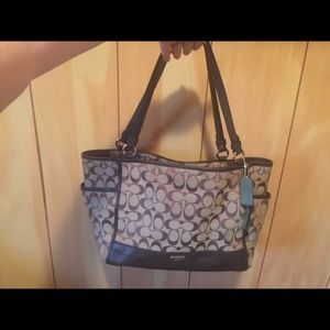 Large tan coach shoulder bag