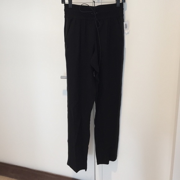 Black A.L.C. pants with piping on the side