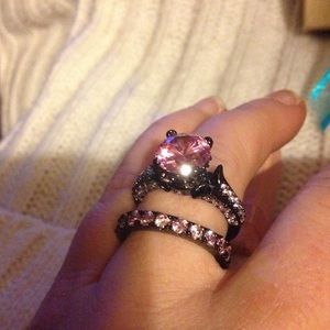 Pink stone/black band ring. New but no tags!