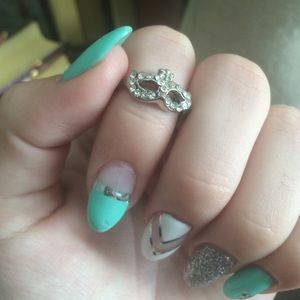 Masquerade and cross ring