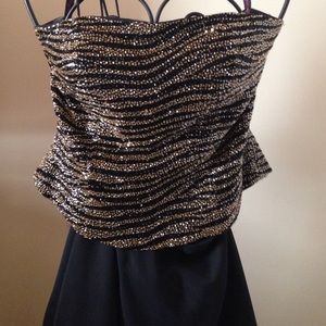 Hand beaded bustier and hi-lo skirt