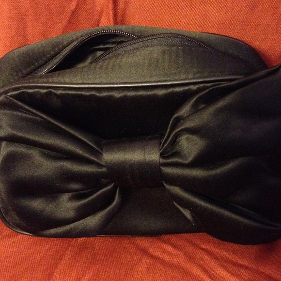 Christian Dior clutch or makeup  bag.