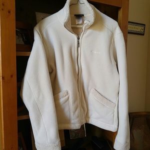 Patagonia cream colored full zip jacket.