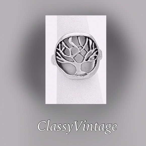 Jewelry - Cut out silver tone metal tree of life ring.