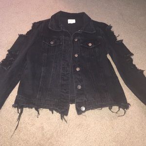 Jean jacket with rips