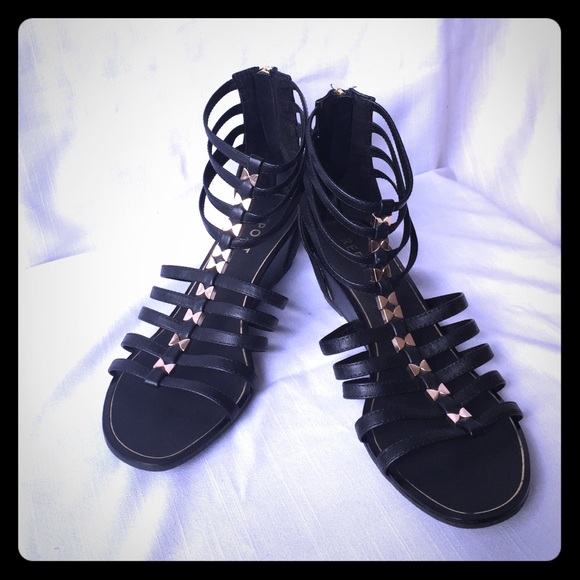 Report black w/ gold accents Gladiator sandals