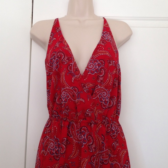 Long red paisley print dress.