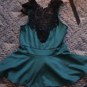 Green and black peplum top