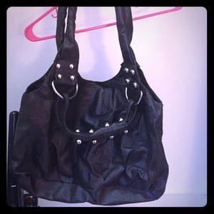 Dark brown peather purse with metal accents