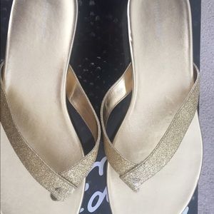 Gold flip flops