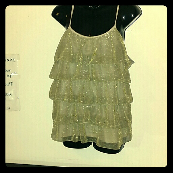 A gold shimmer top