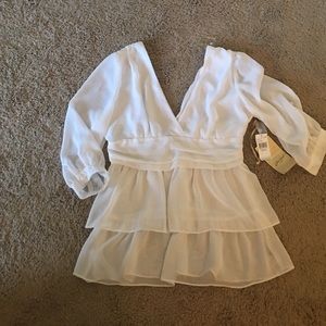 Sophisticated White work blouse.