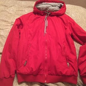 Red windbreaker jacket