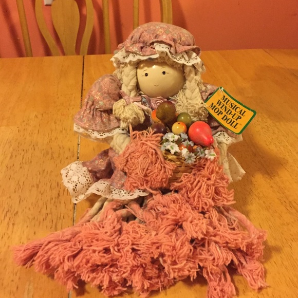 Musical windup mop doll reserved for Mickey