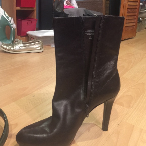 Black leather high heeled bootie