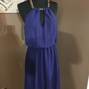 High low purple dress with gold chain