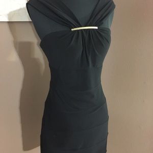 Fitted black after five dress . Gold detail