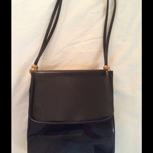 Black patent leather purse.  Classic style, design