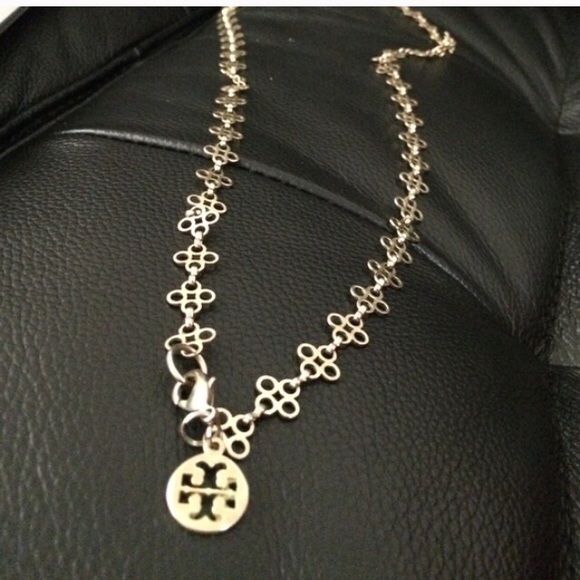 Tory Burch gold necklace with clasp.