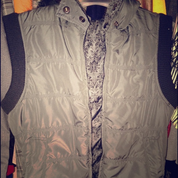 Adorable puffy vest with fur lined hood