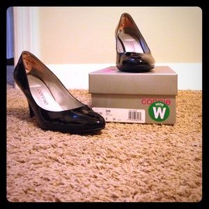 Black patent leather pumps