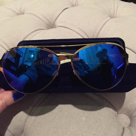 Mykita mirrored blue and gold sunglasses.