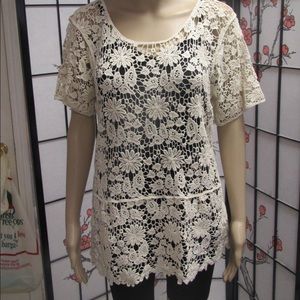 Beige sheer crochet top. Button back