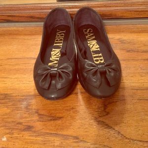 Black bow flats