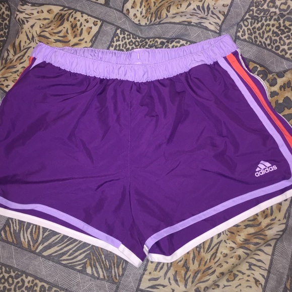 Purple Adidas fitness shorts.