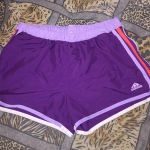 Purple Adidas fitness shorts.