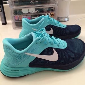 Mint color nike running shoes