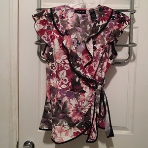 Access size M floral ruffle tie blouse.