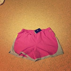 Pink and green Nike shorts