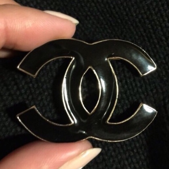 Black gold brooch