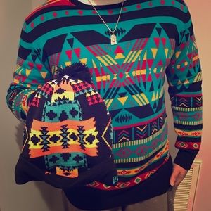Men's Multicolored Sweater and New Era Beanie Hat.