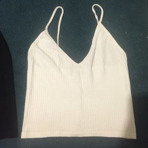 2 black and white tank tops