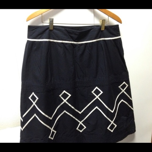 LOFT, navy A-line skirt w/ cream geometric design.