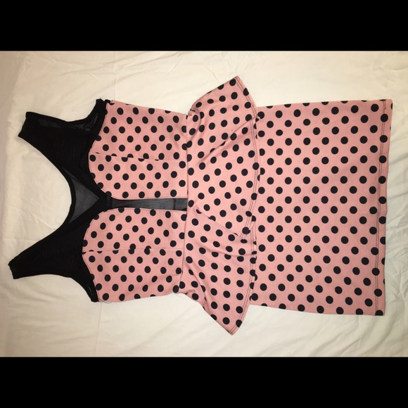 Plus size polka dot peplum dress.