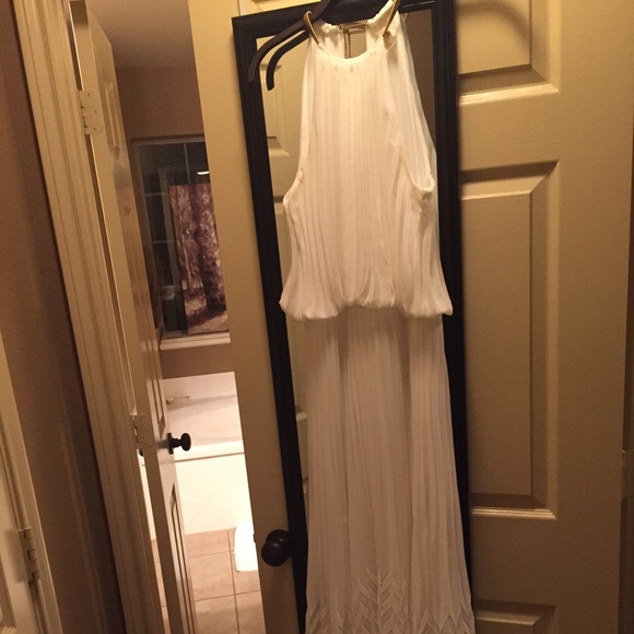 Long, white with gold accents sleeveless dress