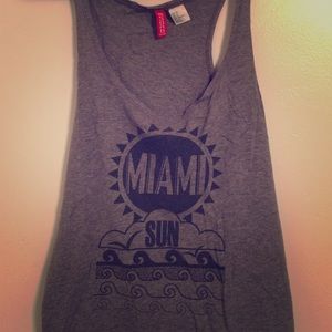 Gray graphic tank.