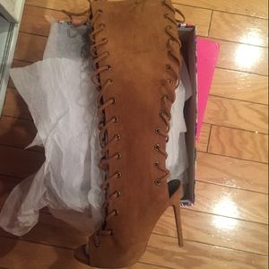 Knee high lace up boots