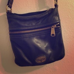 Black leather fossil bag.