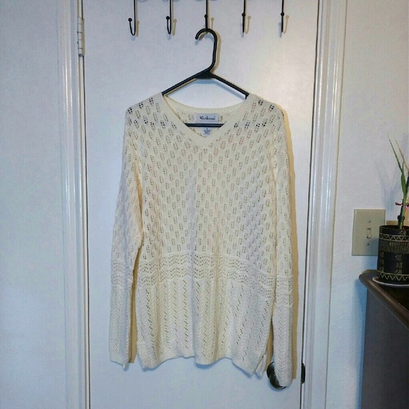 Cream-colored crocheted sweater