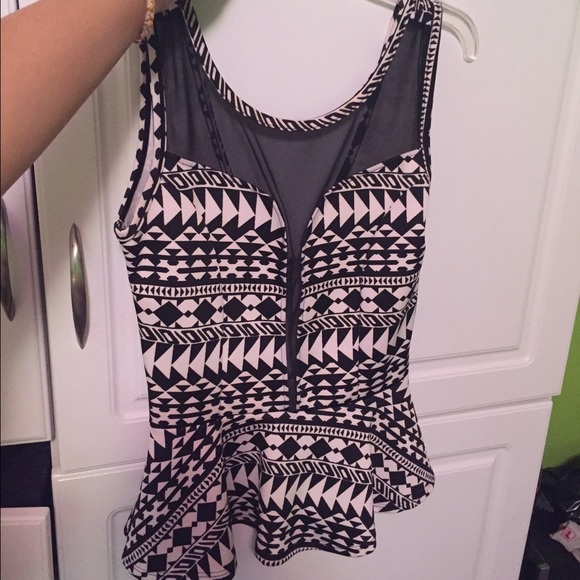 Flared and fitted islander party top